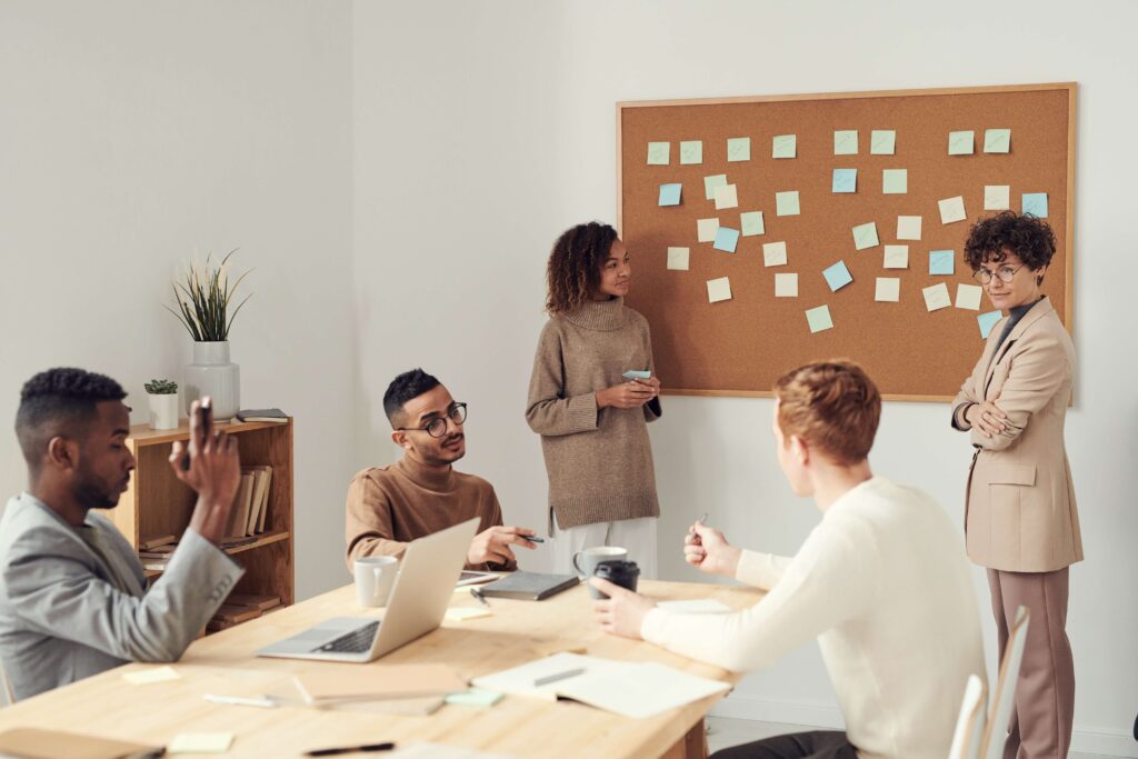 Diverse group of people working together on a new blog project.